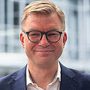 Porträt von Dr. Arne Benzin